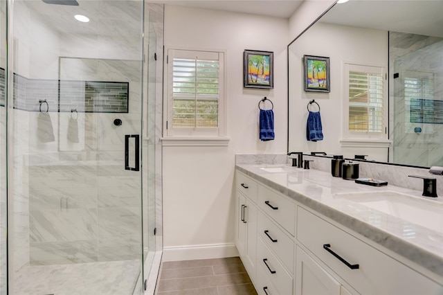 1410 Del Norte St, Houston, TX 77018 - full bath featuring double vanity, a shower stall, tile patterned flooring, and recessed lighting