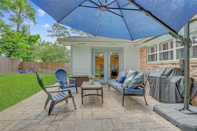 1410 Del Norte St, Houston, TX 77018 - fenced backyard featuring french doors, a patio area, an outdoor living space, and grilling area