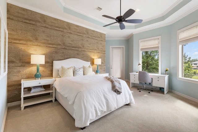 2 N Badger Lodge Cir, The Woodlands, TX 77389 - bedroom featuring carpet, ornamental molding, a raised ceiling, and ceiling fan