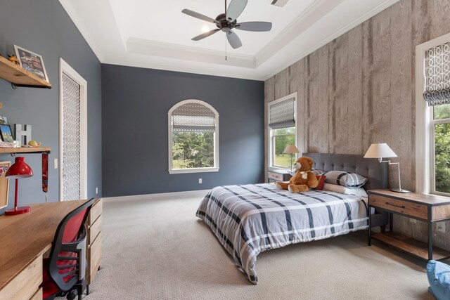 2 N Badger Lodge Cir, The Woodlands, TX 77389 - carpeted bedroom with a raised ceiling, crown molding, and a ceiling fan