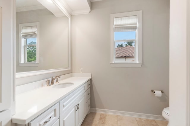 2 N Badger Lodge Cir, The Woodlands, TX 77389 - bathroom featuring vanity, healthy amount of natural light, and crown molding