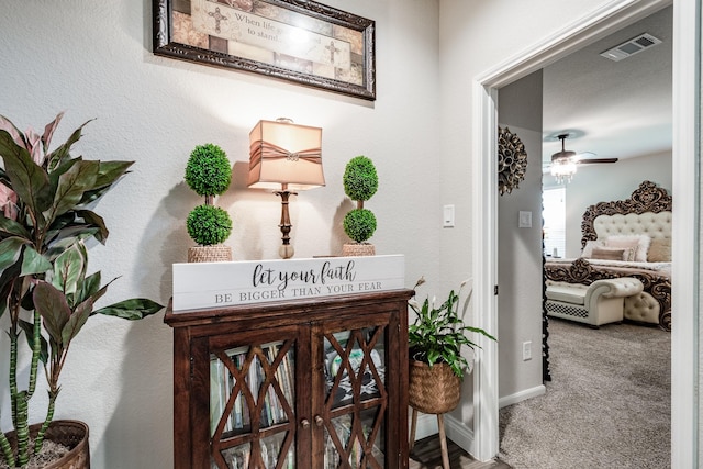 18202 Octavio Frias Trl, Houston, TX 77044 - detailed view of carpet flooring and a ceiling fan