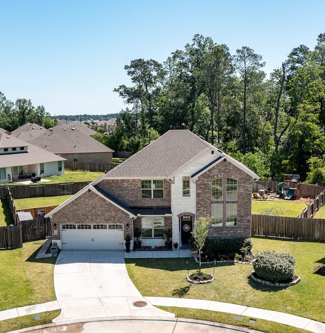 18202 Octavio Frias Trl, Houston, TX 77044 - view of front facade featuring driveway, a garage, and brick siding