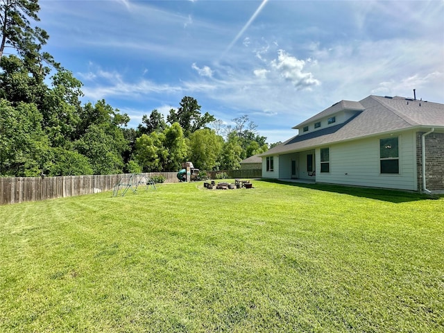 18202 Octavio Frias Trl, Houston, TX 77044 - fenced backyard with a playground