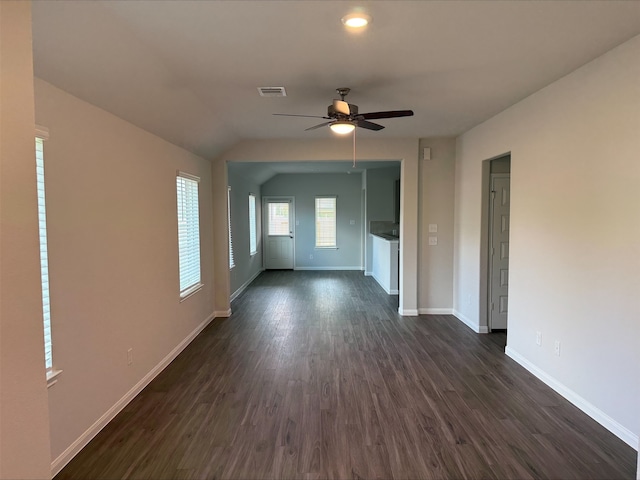 2360 Mooneye Ct, Conroe, TX 77384 - unfurnished living room featuring ceiling fan, dark wood-style flooring, and vaulted ceiling