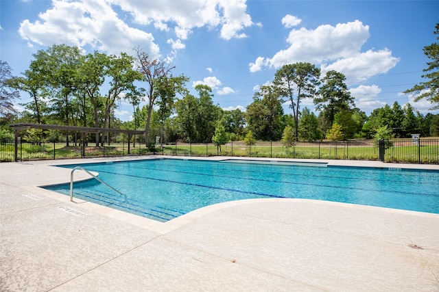 2360 Mooneye Ct, Conroe, TX 77384 - community pool with view of wooded area
