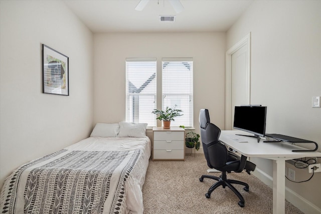9520 London Bridge Sta, Houston, TX 77045 - bedroom with light carpet, a desk, and a ceiling fan