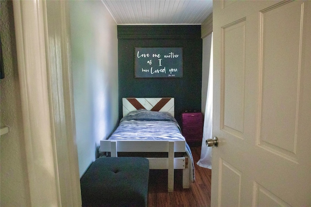 1315 N Roberson St, Conroe, TX 77301 - bedroom featuring wood finished floors
