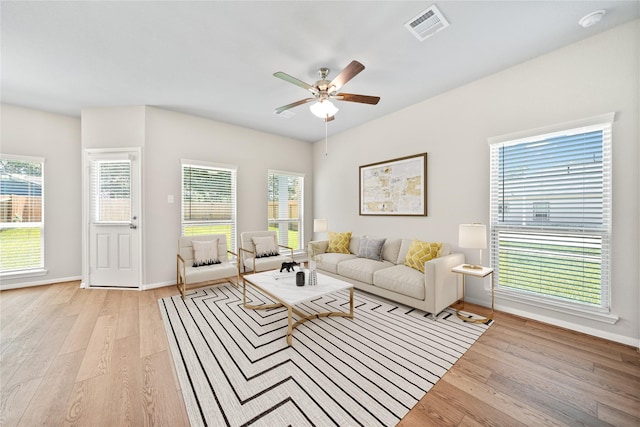 426 Emerald Thicket Ln, Huffman, TX 77336 - living room with ceiling fan and light wood-type flooring