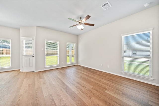 426 Emerald Thicket Ln, Huffman, TX 77336 - spare room featuring a ceiling fan, light wood-type flooring, and a smoke detector