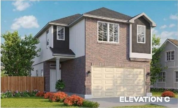 426 Emerald Thicket Ln, Huffman, TX 77336 - view of front facade with brick siding and a garage