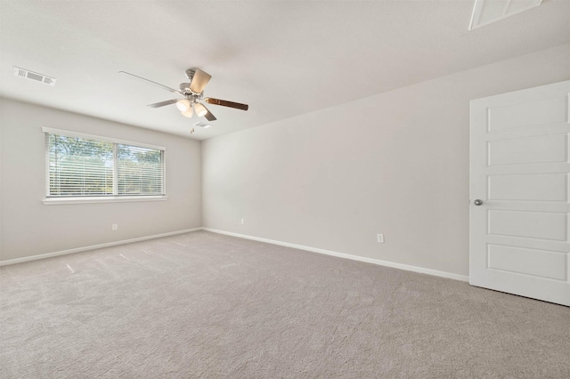 426 Emerald Thicket Ln, Huffman, TX 77336 - spare room with ceiling fan and light carpet