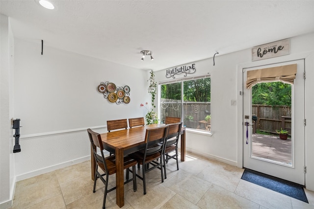 151 Anise Tree Pl, The Woodlands, TX 77382 - dining area with healthy amount of natural light