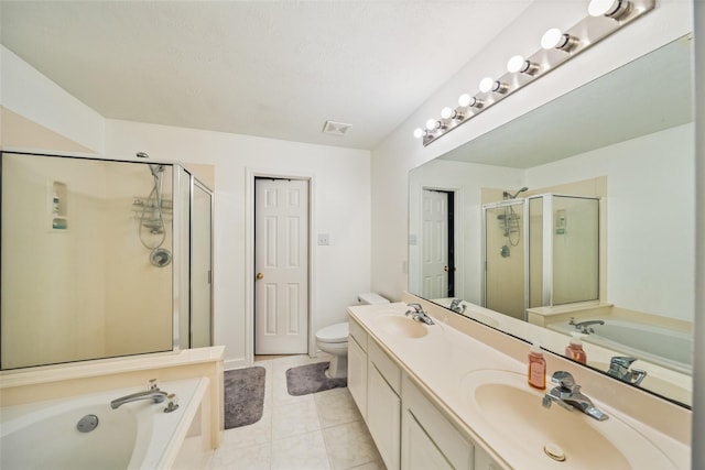 151 Anise Tree Pl, The Woodlands, TX 77382 - full bathroom featuring a shower stall, a garden tub, double vanity, and tile patterned flooring