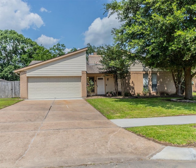 16841 Aprilmont Dr, Sugar Land, TX 77498 - mid-century home featuring brick siding, driveway, an attached garage, and a chimney