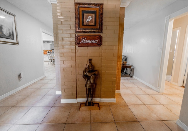 16841 Aprilmont Dr, Sugar Land, TX 77498 - corridor with light tile patterned floors and baseboards