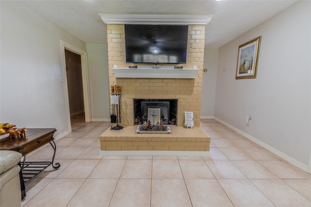 16841 Aprilmont Dr, Sugar Land, TX 77498 - tiled living room featuring a fireplace and a textured ceiling
