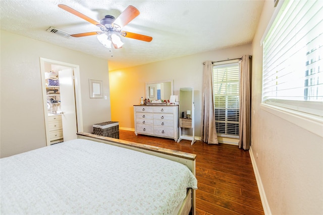 16841 Aprilmont Dr, Sugar Land, TX 77498 - bedroom featuring dark wood-type flooring and ceiling fan
