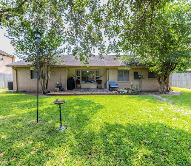 16841 Aprilmont Dr, Sugar Land, TX 77498 - back of property featuring brick siding and a patio area