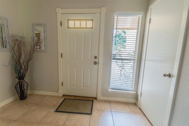 16841 Aprilmont Dr, Sugar Land, TX 77498 - entryway with light tile patterned floors and healthy amount of natural light