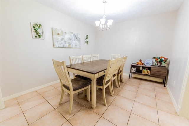 16841 Aprilmont Dr, Sugar Land, TX 77498 - dining space with a chandelier and light tile patterned floors