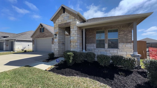 1818 Homewood Point Ln, Rosharon, TX 77583 - view of front facade featuring a garage, roof with shingles, brick siding, concrete driveway, and stone siding