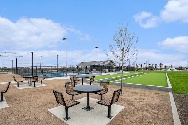 1818 Homewood Point Ln, Rosharon, TX 77583 - view of home's community with a bocce ball area and a tennis court