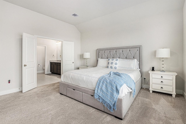 1818 Homewood Point Ln, Rosharon, TX 77583 - bedroom featuring carpet flooring, vaulted ceiling, and ensuite bathroom