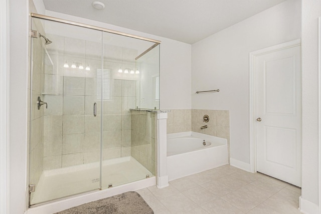 1818 Homewood Point Ln, Rosharon, TX 77583 - full bathroom with tile patterned floors, a bath, and a stall shower