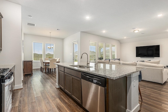 1818 Homewood Point Ln, Rosharon, TX 77583 - kitchen featuring appliances with stainless steel finishes, dark wood finished floors, healthy amount of natural light, and recessed lighting