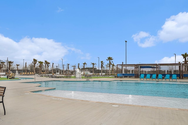 1818 Homewood Point Ln, Rosharon, TX 77583 - community pool featuring a patio area