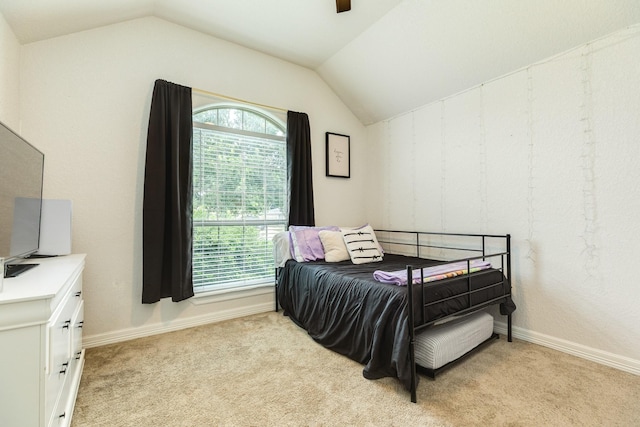 203 Poppy St, Lake Jackson, TX 77566 - bedroom with lofted ceiling, light carpet, and ceiling fan