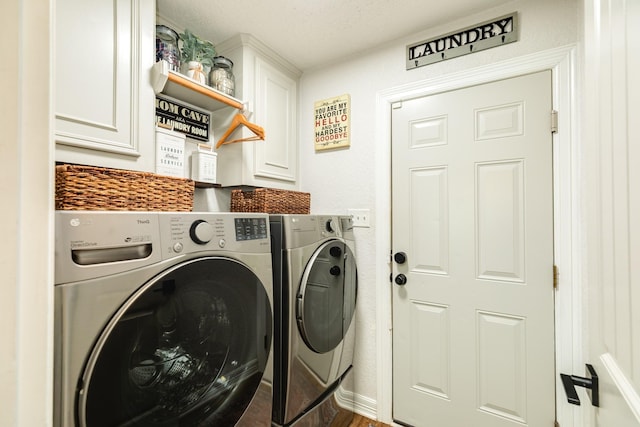 203 Poppy St, Lake Jackson, TX 77566 - laundry room featuring cabinet space, washer and dryer, and a textured ceiling