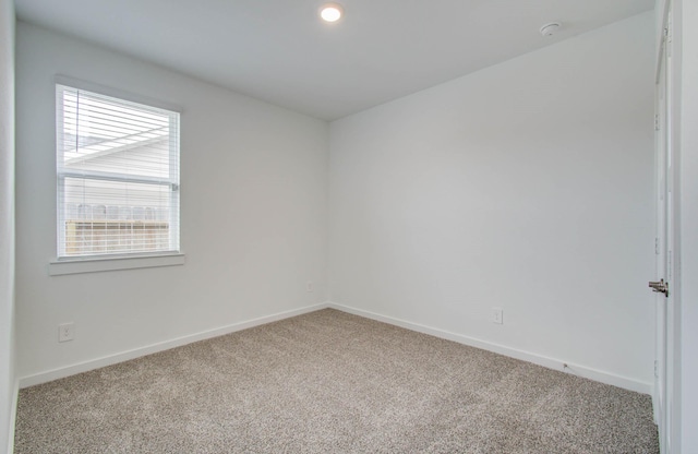 309 Pleasant Hill Way, Conroe, TX 77304 - unfurnished room featuring carpet and a smoke detector