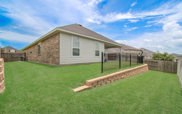309 Pleasant Hill Way, Conroe, TX 77304 - back of house with brick siding and a fenced backyard