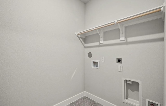 7827 Albury Mnr, Richmond, TX 77407 - laundry area with hookup for an electric dryer, washer hookup, and dark tile patterned floors
