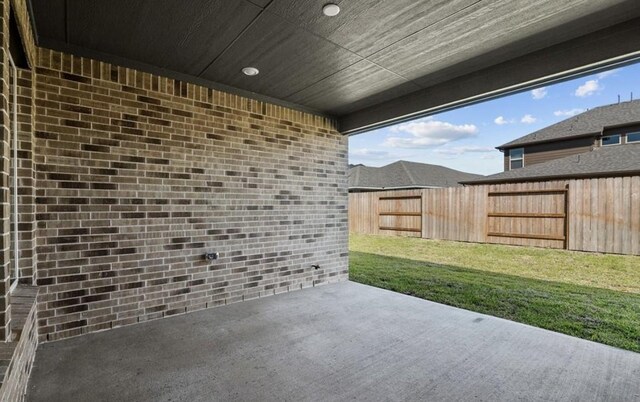 7827 Albury Mnr, Richmond, TX 77407 - fenced backyard featuring a patio area