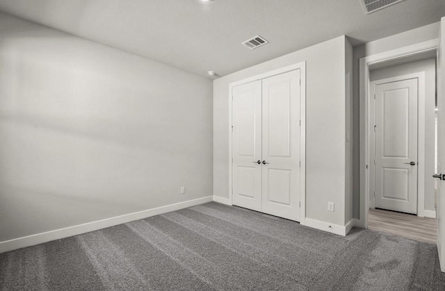 7827 Albury Mnr, Richmond, TX 77407 - unfurnished bedroom with carpet floors and a closet