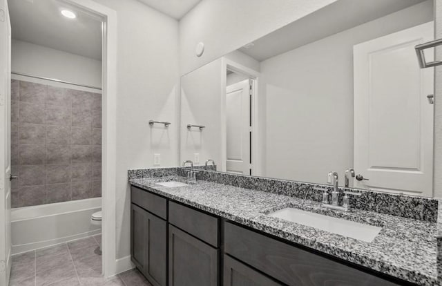 7827 Albury Mnr, Richmond, TX 77407 - full bath with double vanity, tile patterned flooring, and shower / bathtub combination