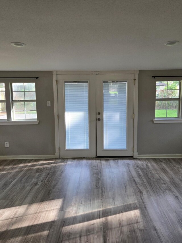 204 Jasmine St, Lake Jackson, TX 77566 - foyer with wood finished floors and french doors