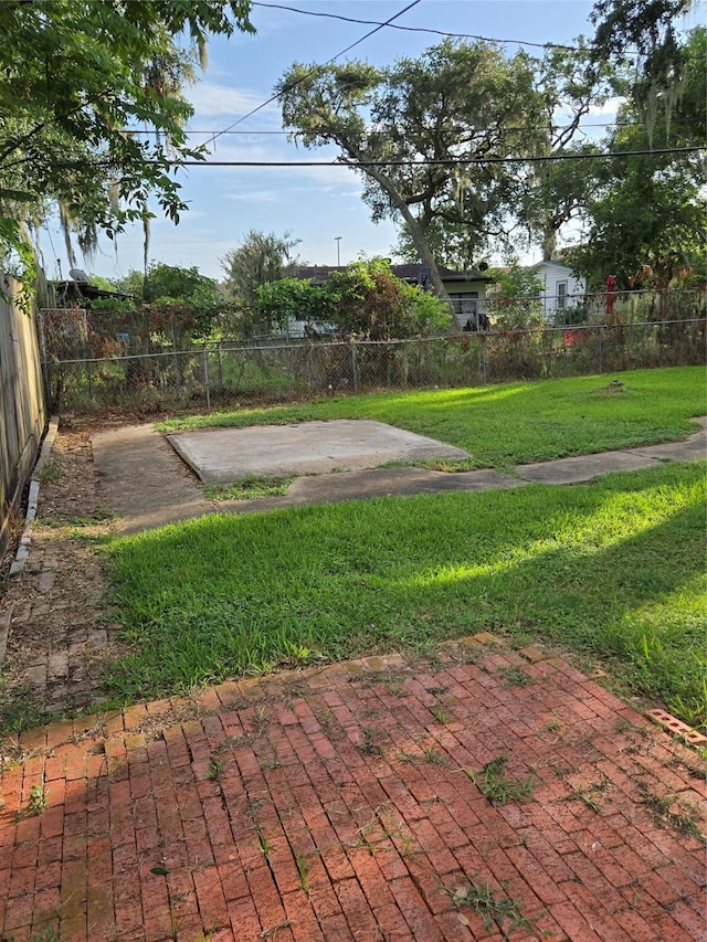 204 Jasmine St, Lake Jackson, TX 77566 - view of yard featuring a patio
