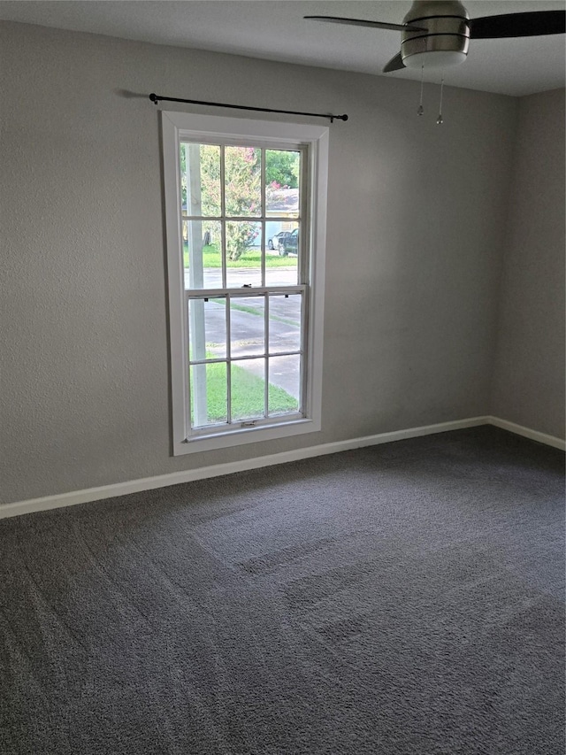 204 Jasmine St, Lake Jackson, TX 77566 - carpeted spare room with baseboards and a ceiling fan