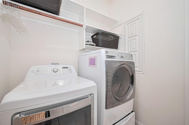 25603 Kearsley Dr, Katy, TX 77494 - washroom with washing machine and dryer