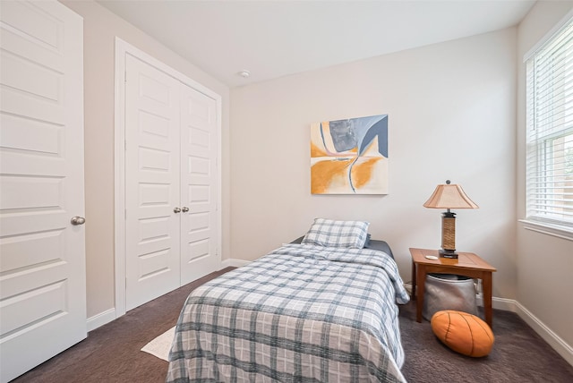 25603 Kearsley Dr, Katy, TX 77494 - bedroom with dark carpet and a closet