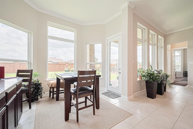 25603 Kearsley Dr, Katy, TX 77494 - dining space with crown molding and light tile patterned floors