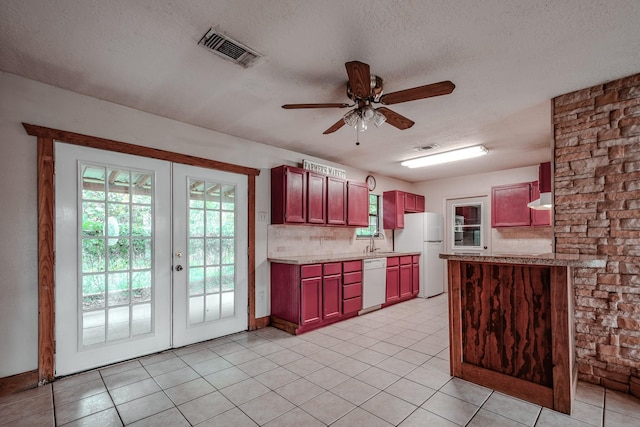 521 Northwood Dr, Point Blank, TX 77364 - kitchen featuring white appliances, ceiling fan, light tile patterned flooring, and a textured ceiling