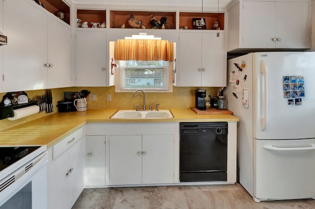 820 Meadow Ln, Wharton, TX 77488 - kitchen featuring white appliances, light countertops, white cabinetry, and tasteful backsplash