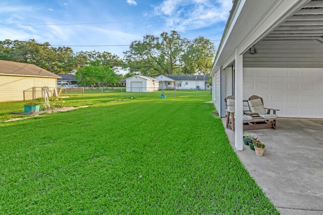 820 Meadow Ln, Wharton, TX 77488 - view of yard with a garage