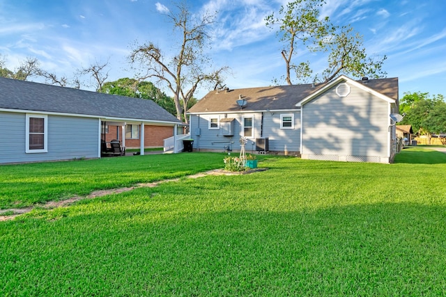 820 Meadow Ln, Wharton, TX 77488 - rear view of house with a yard