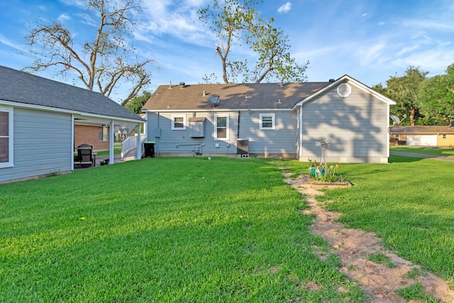 820 Meadow Ln, Wharton, TX 77488 - back of house with a yard